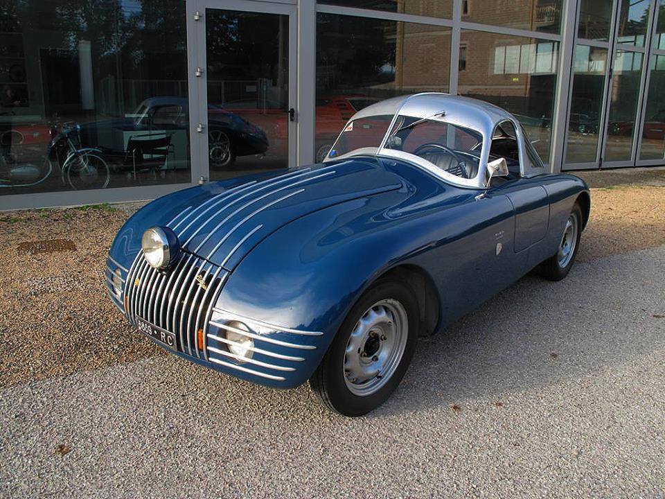 Fiat 1100 Spider 1948 Agenda événements auto moto de Daniela DAUDE artiste Mobilier avec pièces auto moto. RDV Rallye touristique MOUANS SARTOUX Recette reversée à L'AFMTELETHO
